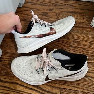 Nike running shoes, pink and tortoise